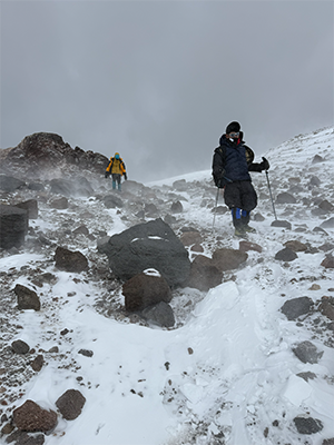 HME team managing logistics at a base camp.