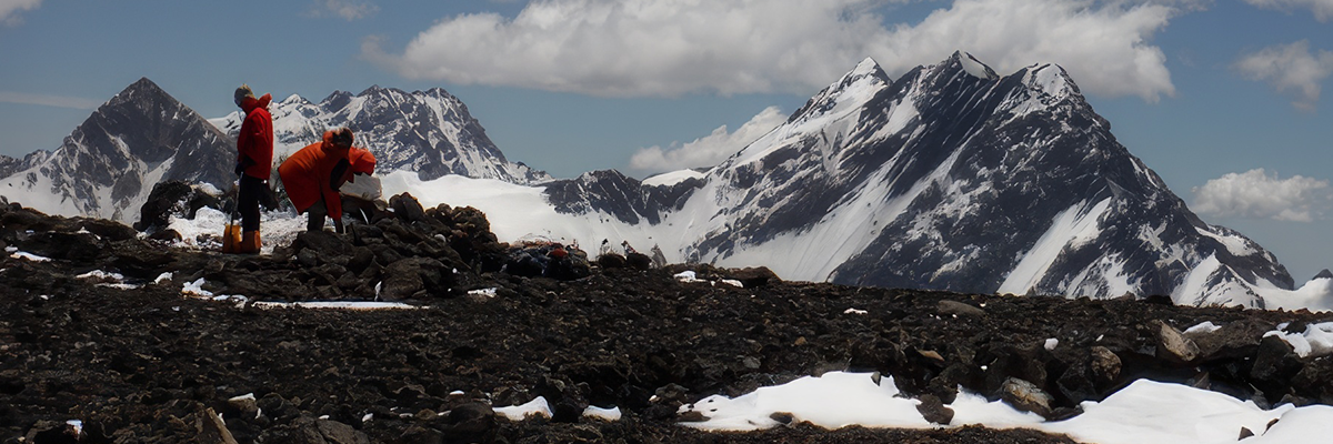Panoramic view of the Cerro Marmolejo glacier with mountaineers ascending.