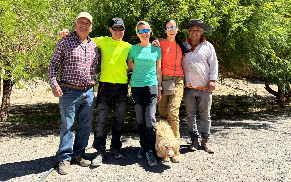 Mountaineers with local Colla community hosts at Don Juan camp, Ojos del Salado expedition.